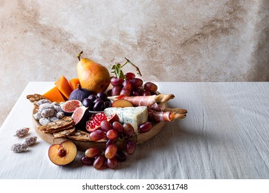 Appetizers Table With Italian Antipasti Snacks Or Authentic Traditional Spanish Tapas Set. Fall Fruit, Cheese And Meat Variety Board. 