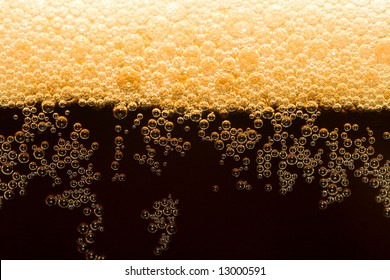 Appetizing Filtered Dark Beer With Foam