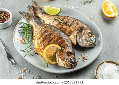 Appetizing fried dorado fish. Restaurant menu, dieting, cookbook recipe top view.