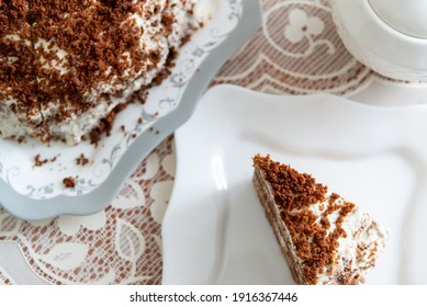 Appetizing homemade cake with coffee biscuit and a sour cream