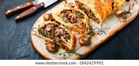 Appetizing mushroom pie or wellington mushroom. English home cooking.