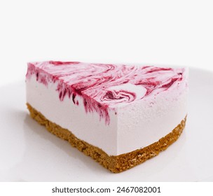 Appetizing piece of raspberry swirl cheesecake served on a clean white plate, isolated on white background