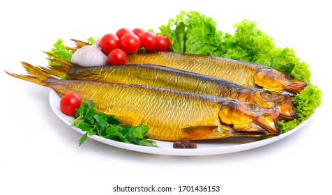 Appetizing smoked fish on a platter