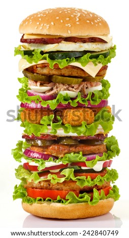 Appetizing super big burger isolated on white background. King size burger.