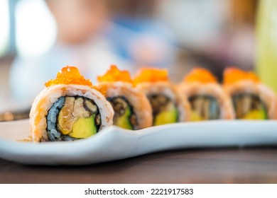 Appetizing sushi roll philadelphia with salmon. Sushi menu. Japanese food.