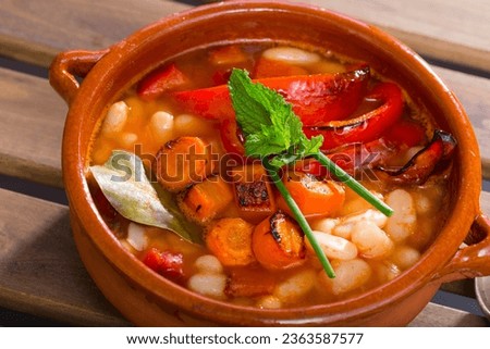 Appetizing traditional Bulgarian bean soup - Bob Chorba served in clay bowl