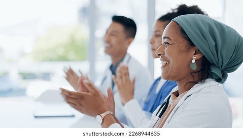 Applause, success and winner with doctors in meeting for presentation, medical and research. Training, healthcare and diversity with group of people in workshop event for medicine, target or teamwork - Powered by Shutterstock