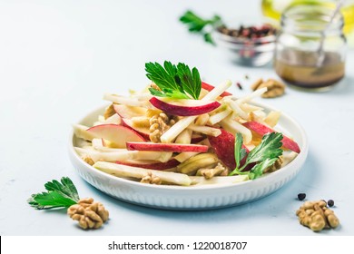 Apple, Celery Root Walnut Salad With Olive Oil, Mustard, Honey Dressing. Selective Focus, Space For Text.