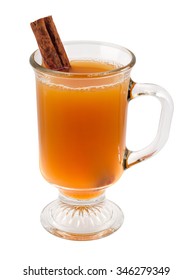 Apple Cider and Cinnamon Stick in a Glass Mug. The image is a cut out, isolated on a white background, with a clipping path. Traditionally served around the holidays.