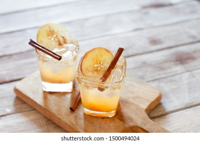 Apple Cider Cocktail With Cinnamon And Apple Slices Traditional Autumn And Winter Drink