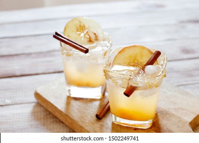 Apple Cider Cocktail With Cinnamon And Apple Slices Traditional Autumn And Winter Drink