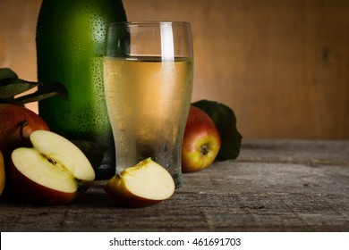 Apple Cider In Glass Bottle With Water Drops