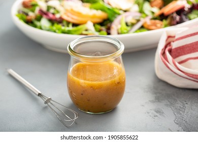 Apple cider vinaigrette salad dressing in a mason jar
