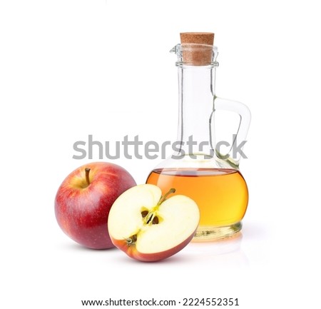 Apple cider vinegar in glass decanter bottle with red apple fruit isolated on white background. Stok fotoğraf © 