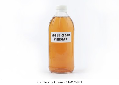 Apple cider vinegar isolated on white
