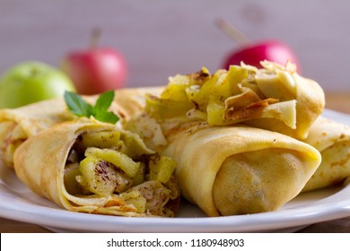 Apple Cinnamon Crepes. Pancakes With Caramelized Apples And Cinnamon 