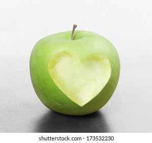 Apple with a heart-shaped bite.