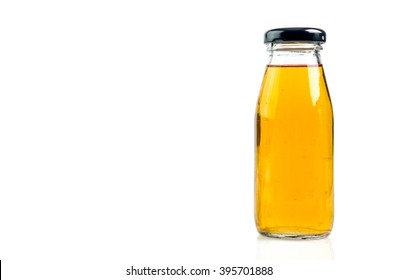 Apple Juice A Bottle On A White Background.