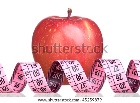 Apple and measure tape isolated on a over white background