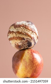 Apple With Mold And Fresh Apple On Beige Background - Mold Growth And Food Spoilage Concept