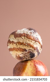 Apple With Mold And Fresh Apple On Beige Background - Mold Growth And Food Spoilage Concept