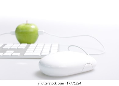 Apple Mouse And Keyboard On The Desk