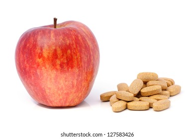 Apple And Multivitamin Supplement In Tablet.