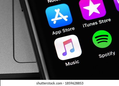 Apple Music and Spotify icon apps on the screen iPhone. Spotify - online streaming audio service. Moscow, Russia - September 15, 2020