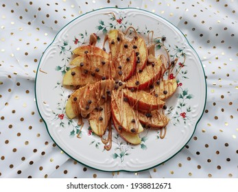 Apple Nachos Topped With Peanut Butter And Chocolate Chips