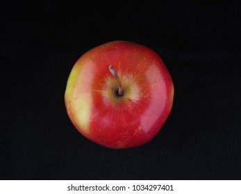 apple on a black background