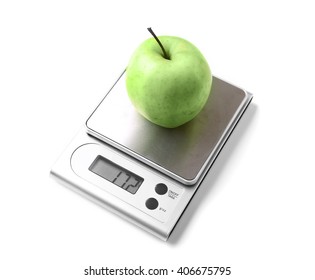 Apple On Digital Kitchen Scales, Isolated On White