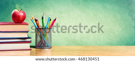Apple On Stack Of Books With Pencils And Blank Chalkboard - Back To School
