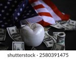 Apple on table money, dollars banknotes. Us business concept. New york big apple.