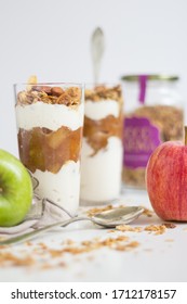 Apple Parfait With Yogurt And Granola On A Marble Surface