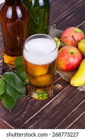 Apple And Pear Cider Glass And Bottles With Fruits