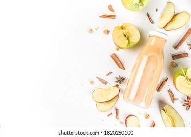 Apple And Pear Smoothie In Small Portioned Bottle, With Fresh Autumn Traditional Spices, Flatlay On White Background 