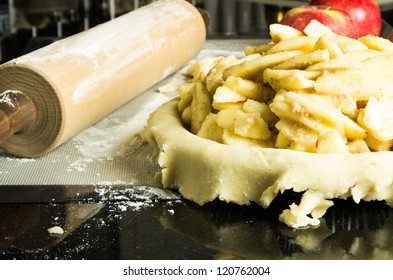 Apple Pie With Apples Filling And Rolling Pin