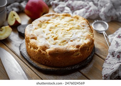 Apple pie for breakfast. Delicious apple pie on a wooden table. Close-up - Powered by Shutterstock