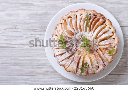 apple pie with cinnamon and mint close up on the table. horizontal top view   Imagine de stoc © 