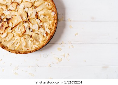 Apple Pie Confectionery Food Copy Space Top View Photography. Classic Appetizing Prepared Fruity Sugary Cake Dessert, Homemade Cookery Dish Recipe. Almond Crumbs on Wooden Kitchen Table