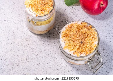 Apple Pie In Jar, Apple Layered Breakfast Parfait Dessert, With Tart Crumble And Spices, No Bake Cheesecake In A Portioned Jars 