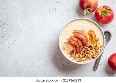 Apple pie smoothie bowl with granola and peanut butter, top view, copy space. Autumn recipe. Vegan food. - Powered by Shutterstock