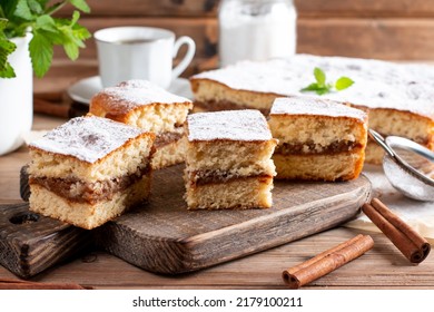 Apple pie, sponge cake, Charlotte with apples on a wooden table - Shutterstock ID 2179100211