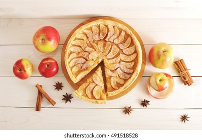 Apple Pie Tart, Ingredients - Apples And Cinnamon On Rustic Wooden Background - Top View