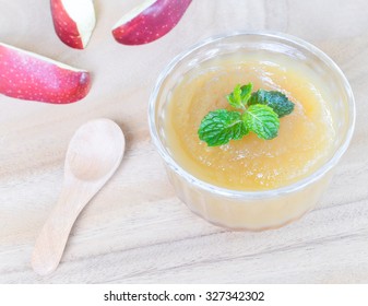 Apple Sauce, For Dessert Or Bread Filling, In A Glass Cup, Place On Wooden Background