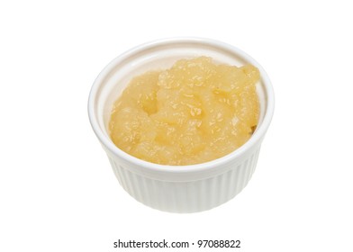 Apple Sauce In A Ramekin Isolated Against White