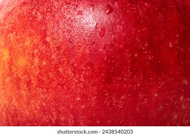 Apple skin with water drops. The texture of an apple is red with yellow. - Powered by Shutterstock