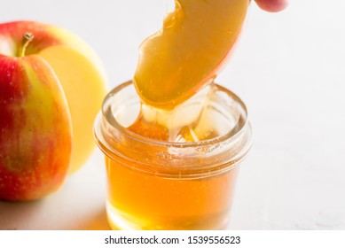Apple Dipped in Honey Images, Stock Photos & Vectors | Shutterstock