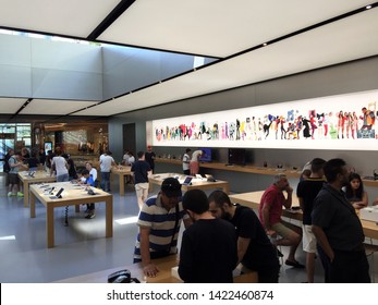 Apple Store Istanbul. Technological products store. Store located in the "Zorlu" shopping center. Customers viewing products and technological products. Istanbul, Besiktas, Turkey. June 10, 2019