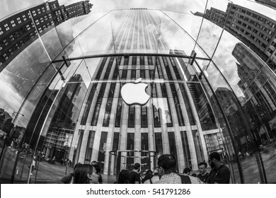 Apple store, New York City, USA - AUGUST 2015: Close up fish eye wide angle of the glass front of the store looking up at the logo and surrounding buildings in Manhattan.